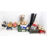 A collection of 8 branded boxed boots and shoes, all size 4