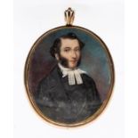 A 19th Century portrait miniature of a Gentleman, with hair and seed pearl decorated reverso in