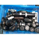 Collection of Minolta 20th century automatic cameras including mixed collection of lenses, cased and