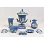 A collection of Wedgwood Jasper ware items, mainly blue and white to include lidded urn, height