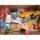 Vintage tinplate, wooden, plastic toy collection to include dogs on wheels, die cast aircraft,