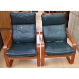 Two modern leatherette easy chairs