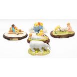 Five boxed Royal Doulton Winnie the Pooh