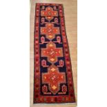 A hand-knotted Persian carpet (runner), from North West region, approx 323cm x 90cm No. 110