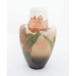 A Rockwood Pottery - American art pottery vase with tulip design. Condition: Crack to rim