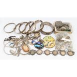 A collection of silver jewellery to include a butterfly wing brooch,  bangles, sporting fobs,