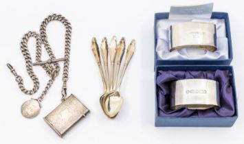 A silver double Albert link watch fob chain along with a silver vesta case, pair of silver napkin