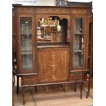 An Edwardian part-glazed display cabinet with Adam style inlay, glazed sides flanking open