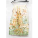 A 1950’s cotton waisted skirt size 10:with a floral design and garden pond with a colorway of