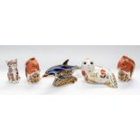 Royal Crown Derby paperweights including a dolphin, kitten, seal and two squirrels, some gold and
