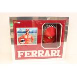 Formula 1: A cased Michael Schumacher montage, containing a signed Ferrari racing cap and a