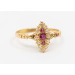 A Victorian ruby and 18ct gold ring, comprising a marquise shaped setting, set with three rubies