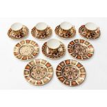 Four Royal Crown Derby 1128 side plates, along with five 1128 Imari teacups and saucers