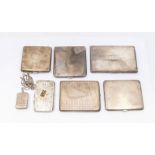 A collection of five early 20th century silver cigarette cases all with Birmingham assay marks,