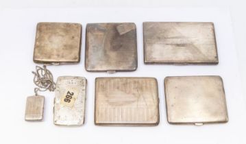 A collection of five early 20th century silver cigarette cases all with Birmingham assay marks,