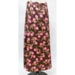 A brushed cotton size 10/12 brown background with a rose and foliage pattered full length metal zip,