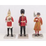 Three Boxed Royal Doulton Iconic London Figures - Guardsman Beefeater and Lifeguard