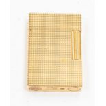 A St Dupont French gold plated lighter, textured design, size approx 55 x 38mm. - NO POSTAGE