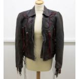 A Canadian leather an fur jacket, the sleeves have wide details in the style of raglan, 1980's, a