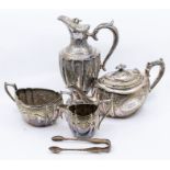 A late 19th Century silver plated claret jug, along with late 19th Century three piece tea set and