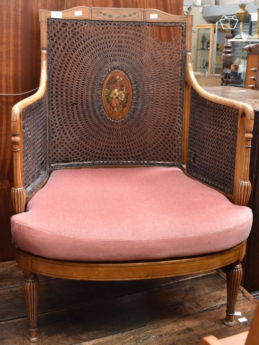 Early 20th Century Edwardian Bergere chair, with hand painted plaque to centre of back rest