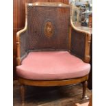 Early 20th Century Edwardian Bergere chair, with hand painted plaque to centre of back rest