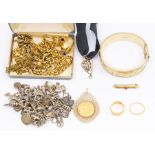 A collection of jewellery including an Elizabeth II sovereign dated 1965 wthin a 9ct gold fancy