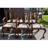 A Reproduction oak old charm dresser along with reproduction dining table and six chairs and old