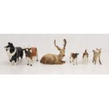 A collection of Beswick animals including stag, fawn, dogs and cattle (6)