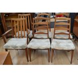 1970's teak dining chairs including two carvers