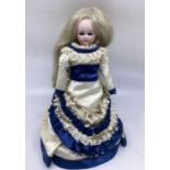 French 19thC belton Type solid dome Bisque head shoulder head doll with kid body; 27” approx. Neat