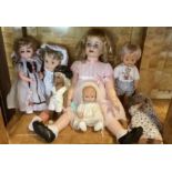 Large selection of 1970s and beyond vinyl dolls including a tall companion doll in blown vinyl(
