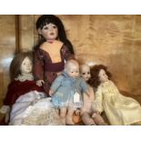 Vintage porcelain collection of dolls inc closed mouth small toddler doll and many others-In good
