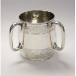 A Victorian silver loving cup, of plan for, chased with foliate banding, Daniel & Charles Houle,