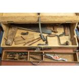 A Victorian / Edwardian pine tool chest, hinged cover opening to reveal various woodworking and