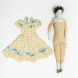 A German porcelain head doll, cloth straw-filled body, bisque hands and feet, stamped Germany 2G,