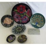 A group of Moorcroft pottery , to include a large charger 35cm , 3 boxed year plates for 1992 , 1993