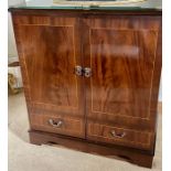 A 20th Century mahogany television cabinet. ***Offsite Location***