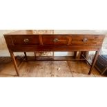 A 19th Century mahogany and ebony strung sideboard, rectangular shaped with a moulded edge top,