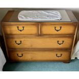 An early 20th century mahogany campaign style chest of drawers, two short over two long