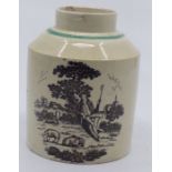 English creamware tea canister , circa 1800 . Printed in black  with the tea party and a shepherd