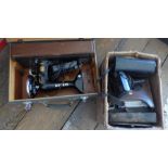 A boxed singer sewing machine and a box of camera and binoculars and odds ( 2 )