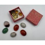 A selection of loose gemstones including three citrines, a smoky quartz (all faceted) plus six