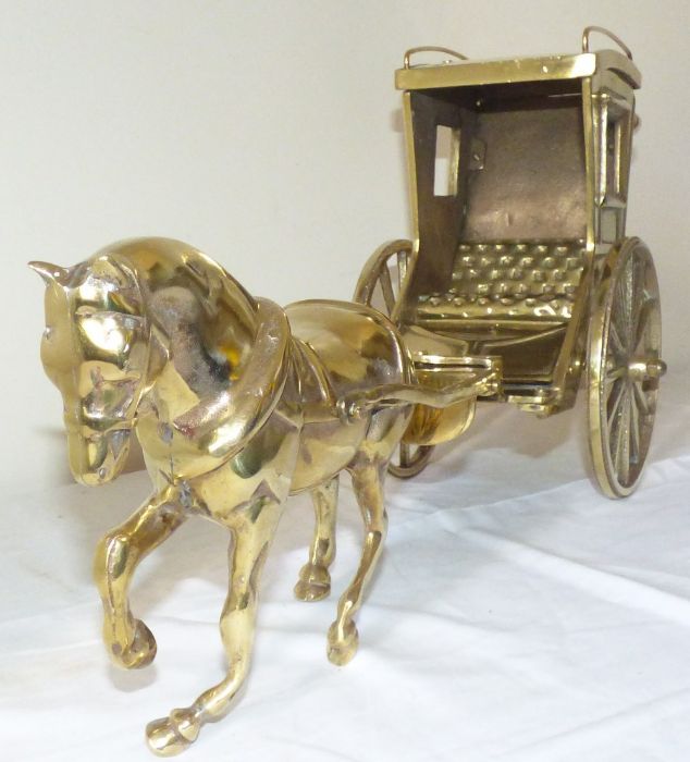 A large brass horse and carriage 58cm in length and 27cm high