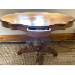 A Victorian walnut serpentine hall table. ***Offsite Location***