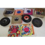 A large collection 0f 45 rpm records . mostly relating to the 1960s