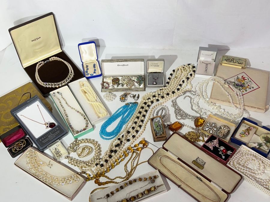 A large selection of vintage costume jewellery comprising of Art Deco glass necklace, imitation