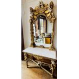 A George III revival mirrored back giltwood and marble top console table, in a John Linnell “The