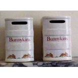 Pair of Royal Doulton bunnykins book money boxes, decorated as shown , both in good condition, with