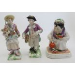Pair of 19th C German figures holding baskets of flowers and a continental figure of a girl